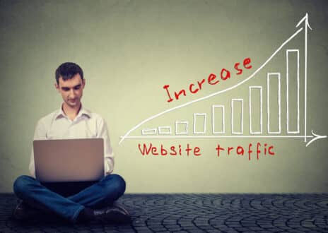 Man using laptop working on a plan - Infintech Designs