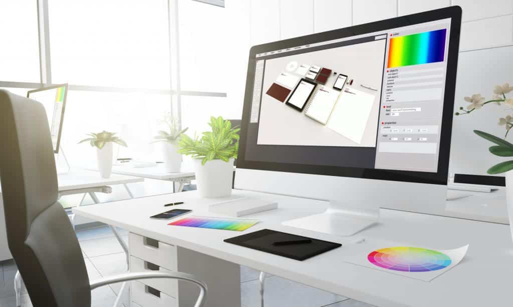 Graphic design on computer screen Infintech Designs